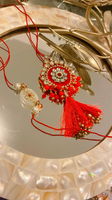 Elegant Red and Pearl Rakhi Set