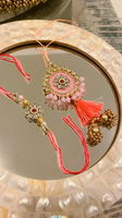 Elegant Red and Pearl Rakhi Set